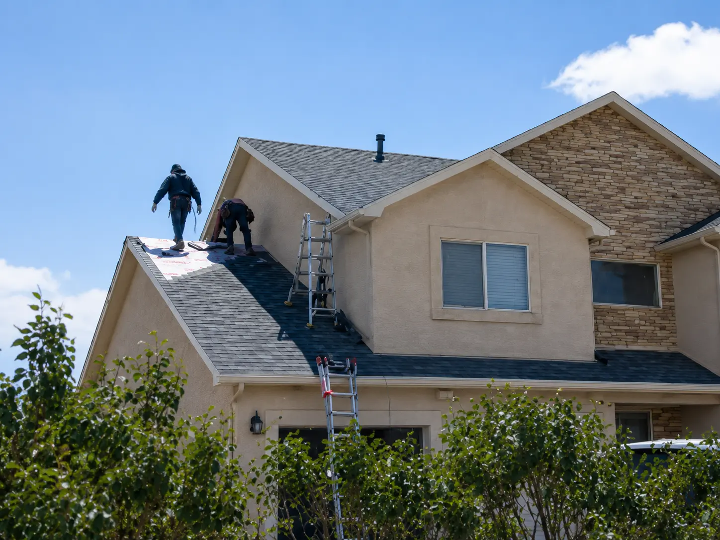 L&J roofing crew installing shingles on a home in Cañon City, Colorado